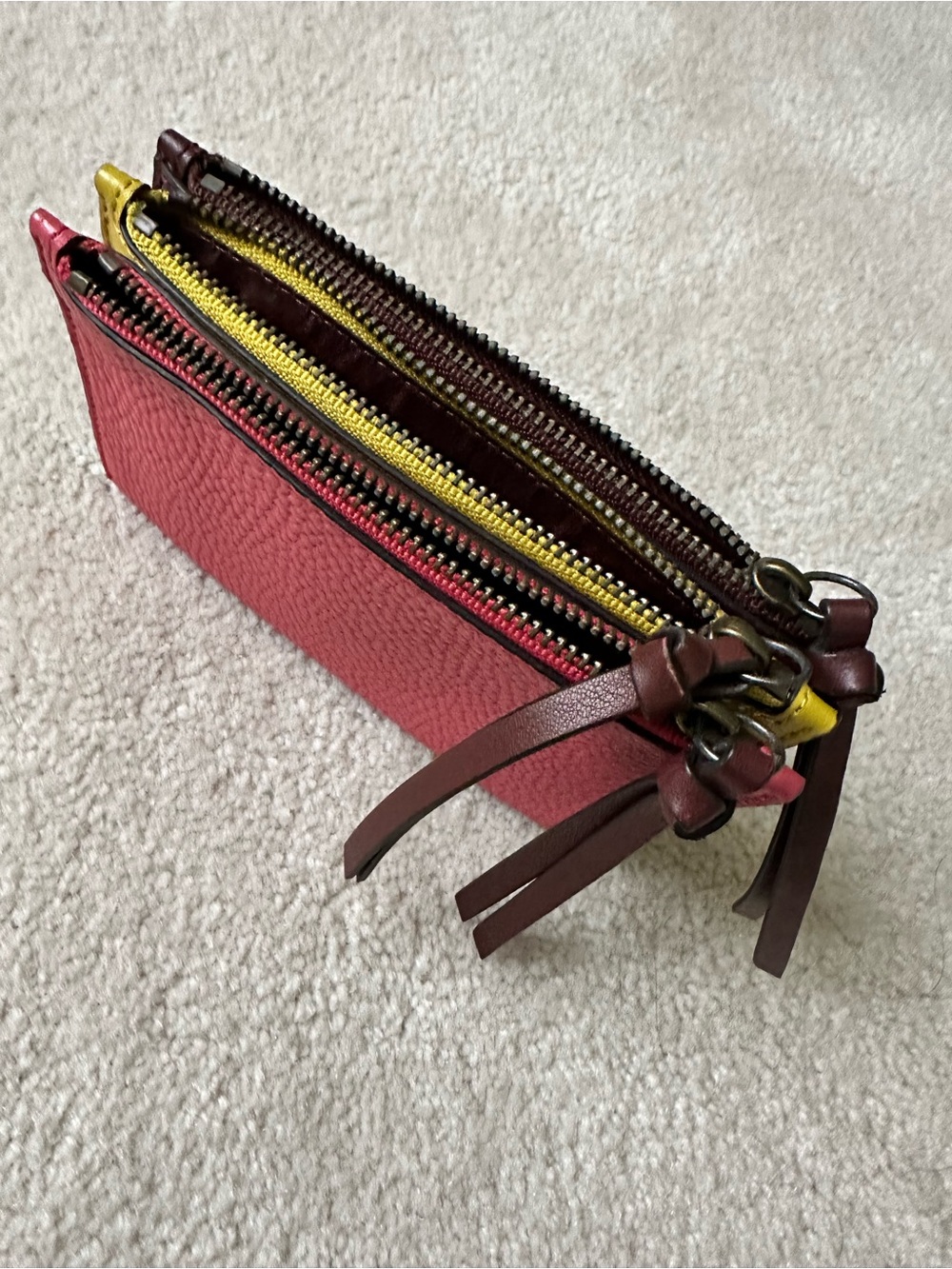 Coach Leather Triple-Zip Wallet in Pink brown and Yellow